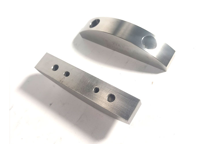 Shaped carbide wear block parts