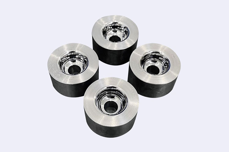 Concave and convex tungsten carbide dies