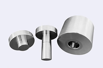 Concave and convex tungsten carbide dies